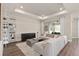 Spacious living room with stylish sectional sofa, tray ceiling, and recessed lighting at 1524 Groveline Rd, St Cloud, FL 34771