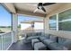 Relaxing outdoor balcony with comfortable seating and a lovely view at 15420 Southern Martin St, Winter Garden, FL 34787