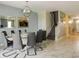 Elegant dining room with stylish chandelier and seating for ten at 1575 Plunker Dr, Davenport, FL 33896