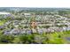 Elevated view of a community close to multiple ponds, capturing the peaceful ambiance of the area at 15862 Citrus Grove Loop, Winter Garden, FL 34787
