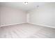 Spacious bedroom with plush carpeting, neutral color palette, and ample space for creating a relaxing atmosphere at 16103 Silver Brook Way, Winter Garden, FL 34787