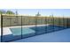 Backyard pool surrounded by a protective black fence for added safety and peace of mind at 16103 Silver Brook Way, Winter Garden, FL 34787