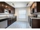 Modern kitchen with stainless steel appliances, granite countertops, and ample cabinet space at 18 Palmira Rd, Debary, FL 32713