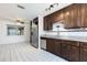 Bright kitchen with stainless steel appliances, granite countertops, and a breakfast nook at 18 Palmira Rd, Debary, FL 32713
