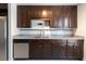 Updated kitchen featuring granite countertops, stainless steel appliances, and ample cabinet space at 18 Palmira Rd, Debary, FL 32713
