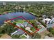 Aerial shot showcasing property boundaries, a modern home, and serene lake views at 1891 Lake Spier Dr, Winter Park, FL 32789