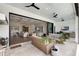 Inviting outdoor living area with comfortable seating, outdoor kitchen and seamless transition to indoor spaces at 1891 Lake Spier Dr, Winter Park, FL 32789