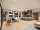 Amenity space offering both lounge seating and dining area with bar at 209 Breezeway Dr, Davenport, FL 33897