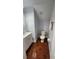 Cozy bathroom with a pedestal sink and unique patterned tile flooring at 2157 Island Walk Dr, Orlando, FL 32824