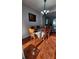 Intimate dining room with decorative chandelier and view into living space at 2157 Island Walk Dr, Orlando, FL 32824