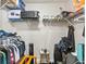 Walk-in closet with abundant shelving space and hanging racks for organized storage at 2501 Grassy Point Dr # 103, Lake Mary, FL 32746