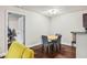The dining area offers a simple table with seating for four at 2501 Grassy Point Dr # 103, Lake Mary, FL 32746