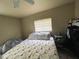 Bedroom with neutral walls, carpet, a window, and a full sized bed at 2506 Perrine Pl, Orlando, FL 32808