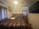Bedroom features ceiling fan, window, and TV at 2506 Perrine Pl, Orlando, FL 32808