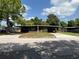 Inviting single-story home with a covered carport and well-kept lawn at 2506 Perrine Pl, Orlando, FL 32808