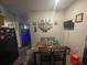 Functional kitchen featuring a dining area with ample counter and cabinet space at 2506 Perrine Pl, Orlando, FL 32808
