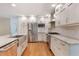 Modern kitchen featuring stainless steel appliances and granite countertops at 3300 Se 22Nd Ave, Ocala, FL 34471