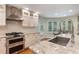 Bright kitchen featuring stainless appliances, granite countertops, and modern fixtures at 3300 Se 22Nd Ave, Ocala, FL 34471