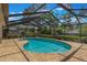 Screened-in pool with brick paved deck, perfect for outdoor relaxation at 3300 Se 22Nd Ave, Ocala, FL 34471