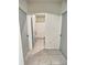 Functional bathroom featuring a tiled floor and a shower/tub combo with a white curtain at 3329 Royal Tern Dr, Winter Haven, FL 33881