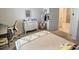 Serene bedroom featuring carpet flooring, neutral decor, and an inviting bed with decorative pillows at 3329 Royal Tern Dr, Winter Haven, FL 33881