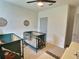 Bright Bedroom featuring two toddler beds, decorative wallpaper, and whimsical décor at 3329 Royal Tern Dr, Winter Haven, FL 33881