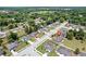 Aerial view of the home in a quiet residential neighborhood with mature trees at 337 Southern Winds Blvd, Deland, FL 32720