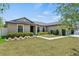 Charming single-story home featuring a landscaped front yard and a welcoming entrance at 337 Southern Winds Blvd, Deland, FL 32720