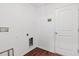 Functional laundry room with tile floors and washer/dryer hookups at 337 Southern Winds Blvd, Deland, FL 32720