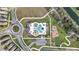 Overhead view of a community pool, playground, parking, and surrounding neighborhood at 338 Wooded Vine Dr, Winter Springs, FL 32708