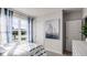 Bright bedroom featuring natural light, stylish decor, and comfortable sleeping area at 3715 Bluethread Way, Poinciana, FL 34759