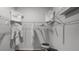 Organized walk-in closet featuring ample shelving and hanging space for clothing and accessories at 3715 Bluethread Way, Poinciana, FL 34759