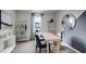 Bright home office with a sleek desk, stylish shelving, and modern decor at 3719 Bluethread Way, Poinciana, FL 34759