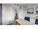 Bright office space with neutral walls, white trim, and a stylish desk, perfect for work or study at 3719 Bluethread Way, Poinciana, FL 34759