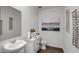 Bright powder room with elegant fixtures, a modern vanity, and stylish decor at 3719 Bluethread Way, Poinciana, FL 34759