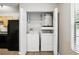 Laundry closet with washer, dryer, and water heater at 485 Forestway Cir # 108, Altamonte Springs, FL 32701