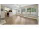 Bright living room with an open layout and updated kitchen, with plenty of natural light at 485 Forestway Cir # 108, Altamonte Springs, FL 32701
