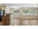 Bright living area with large windows and wood-look flooring at 485 Forestway Cir # 108, Altamonte Springs, FL 32701
