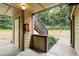 Inviting stairwell with natural light and outdoor access. Features a fire extinguisher for added safety at 485 Forestway Cir # 108, Altamonte Springs, FL 32701