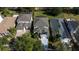 Aerial view of home showing lawn and roof with other homes nearby at 5007 Bellthorn Dr, Orlando, FL 32837