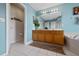 Bright bathroom with double vanity, separate tub, and walk-in shower at 5007 Bellthorn Dr, Orlando, FL 32837