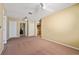 Large bedroom with neutral walls and carpet at 5007 Bellthorn Dr, Orlando, FL 32837
