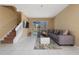 Comfortable living room with large sectional sofa and view of the pool at 5007 Bellthorn Dr, Orlando, FL 32837
