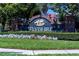 Westshire neighborhood sign with lovely landscaping at 5007 Bellthorn Dr, Orlando, FL 32837