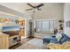 Cozy living room with a bay window seat and views into the adjacent kitchen at 520 Starstone Dr, Lake Mary, FL 32746
