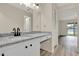 Bathroom vanity showcasing granite counters, matte black fixtures, and ample storage space at 600 Northern Way # 103, Winter Springs, FL 32708