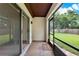 Covered screened patio area offers a relaxing outdoor living space at 600 Northern Way # 103, Winter Springs, FL 32708
