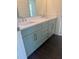 Bathroom with double sinks, and quartz countertop at 6125 Village Edge Pl, Sanford, FL 32771