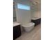 Luxurious bathroom with soaking tub, dual vanities, and sleek fixtures, offering a spa-like experience at 6125 Village Edge Pl, Sanford, FL 32771