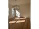 Sunlit bedroom with hardwood floors at 6125 Village Edge Pl, Sanford, FL 32771